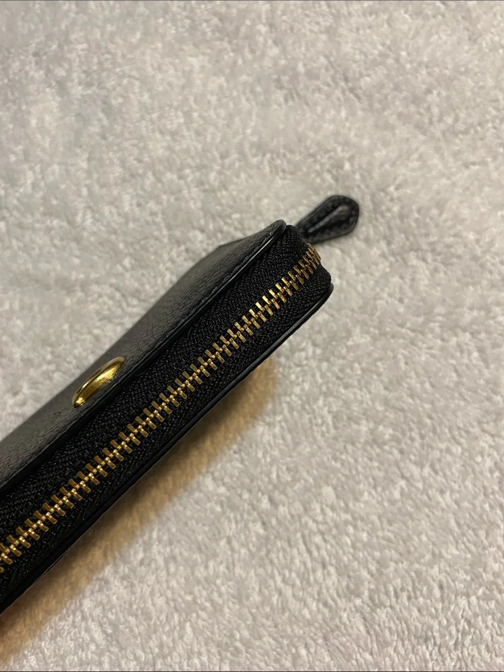 Coach Black Pebbled Leather Zip Card Holder with Gold 'C' Accent